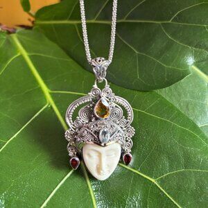 Sterling silver warrior princess pendant with garnet, citrine, and blue topaz